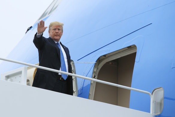 Trump boards Air Force One on Saturday.