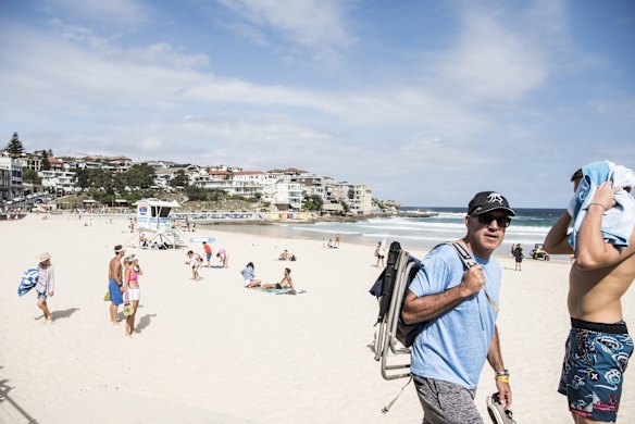 Beachgoer leaving the beach.
