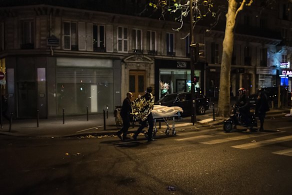 A victim is evacuated from the Bataclan concert hall.