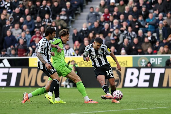 Bruno Guimaraes scores his team’s second goal against Fulham.