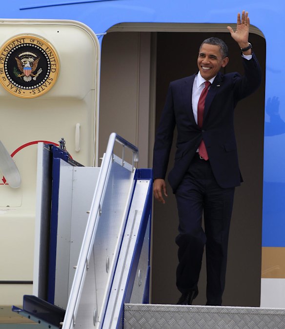 US President Barack Obama disembarks from Air Force One as he arrives in Canberra.