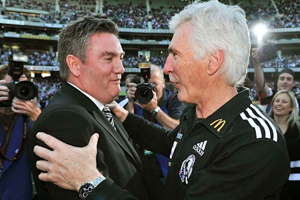 Celebrating the 2010 premiership triumph, over a decade in the making for both men. 