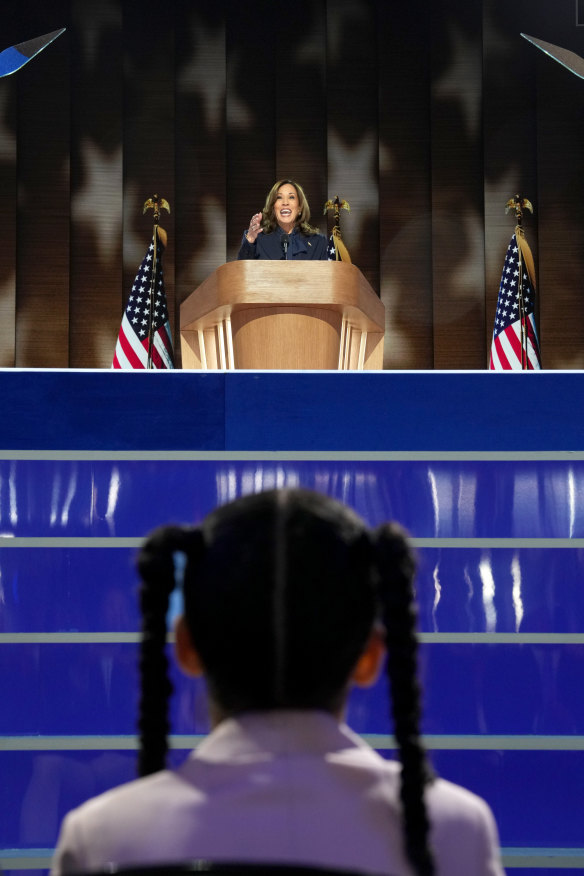 Inspiration: Amara Ajagu takes in Vice President Kamala Harris, the Democratic presidential nominee, on the fourth day of the Democratic National Convention at the United Center in Chicago.