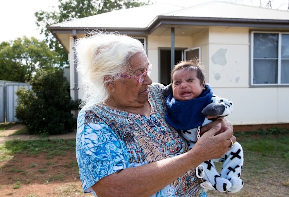 Barbara Ann Ebsworth with her great-grandson, Gordon, in her public housing home in Dubbo. 