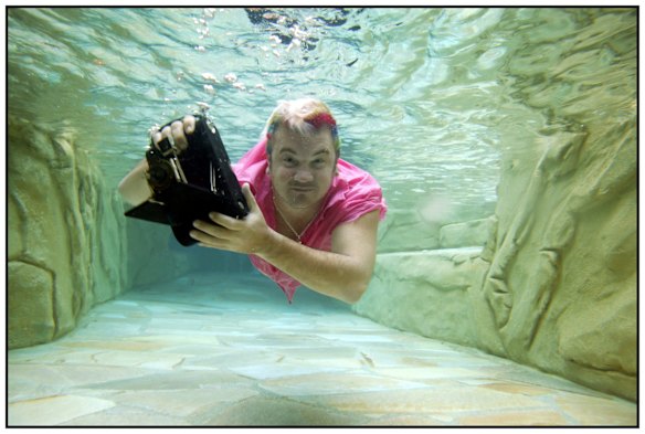 Darren Lyons, paparazzi photographer extraordinaire and head of Big Pictures amongst many other things, in his playboy mansion-esque pool in Geelong. Photo: Jessica Shapiro