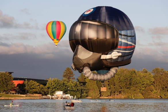 The "RAAF Helmet" hot air balloon, pictured flying over Lake Burley Griffin, will make another appearance at this year's Canberra Balloon Spectacular. 