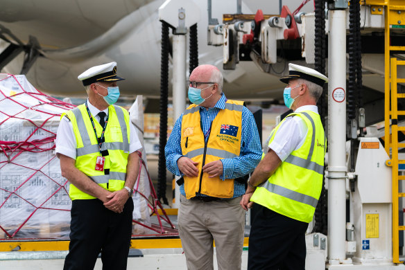 Qantas Captain Phillip Emanuel (L) with Australia’s High Commissioner to the UK George Brandis and
Captain Brett Meyer (R) at Heathrow airport on Saturday 4 September, 2021.