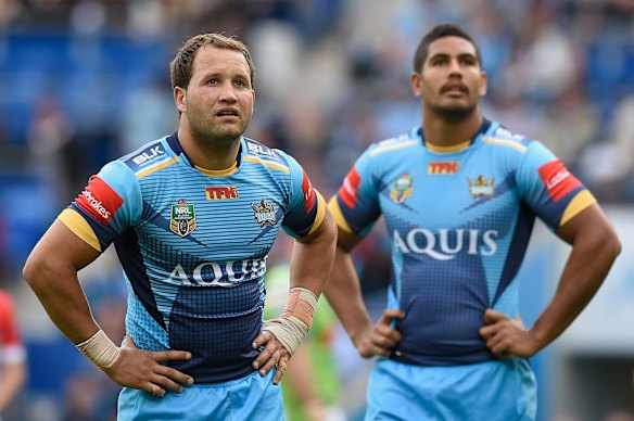 Tyrone Roberts of the Titans looks on.