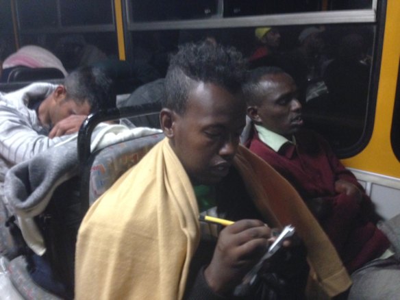 Migrants board buses said to be bound for Austria outside Keleti station in central Budapest, Hungary.