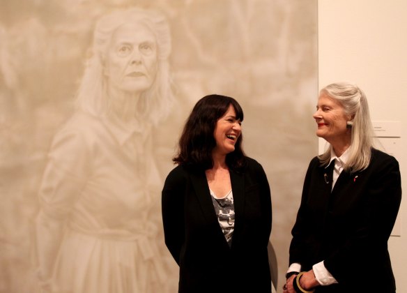 Winner of the 2014 Archibald Prize, Fiona Lowry with her subject, Penelope Seidler, at the NSW Art Gallery in Sydney.