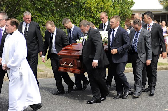 Phillip Hughes casket is carried by the pall bearers during the Funeral Service.