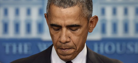 President Barack Obama pauses as he speaks about the shooting at the community college in Oregon. 