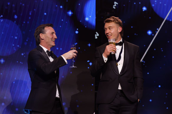 Happy days: AFL chief Andrew Dillon toasts Patrick Cripps after his record-breaking win at this year’s Brownlow Medal count.