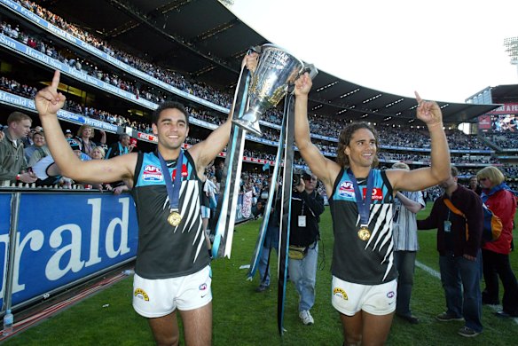 2004 Shaun and Peter Burgoyne of the Power celebrate after winning the AFL Grand Final against the Brisbane Lions.
