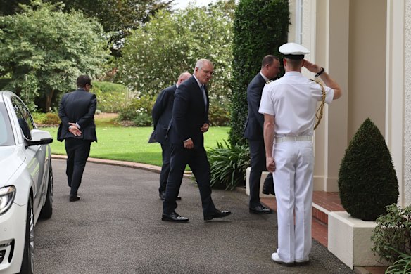 Scott Morrison arrives at Government House.