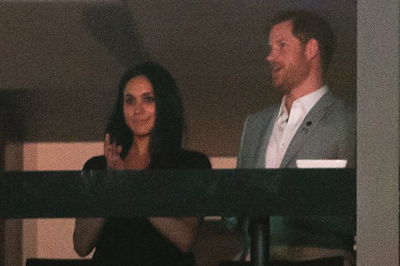 Britain's Prince Harry stands with his girlfriend Meghan Markle during the Invictus Games closing ceremony in Toronto.