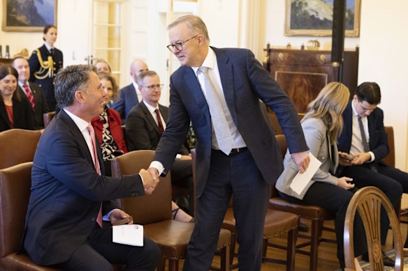 Deputy Labor leader Richard Marles greets the new prime minister-elect.