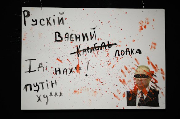 Children's artwork on the subject of the Russian invasion of Ukraine is seen on the walls ahead of a performance of "Mama Po Skaipu" (Mother via Skype) in an air raid shelter in Lviv.