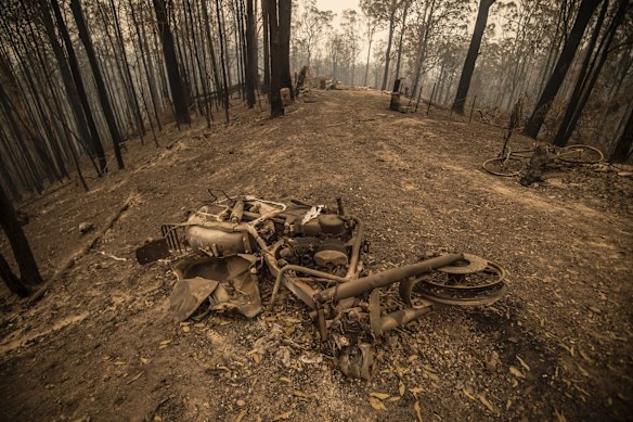 A burnt out motorcycle on the fireground in Taylors Arm near Macksville in northern NSW.