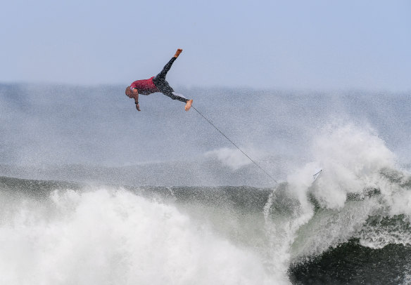 High dive:   Kelly Slater bails out on a Bells monster on Friday.