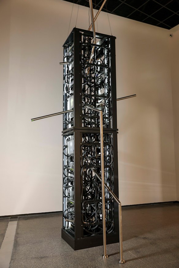 The work comprises two data towers stacked vertically, pierced with stainless steel handrails in what Bennetts jokingly calls an act of revenge.