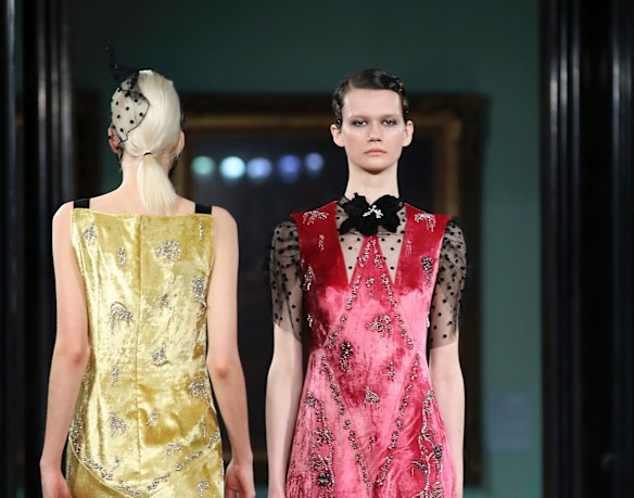 Models wear creations by Erdem at the Autumn/Winter 2018 runway show in London.