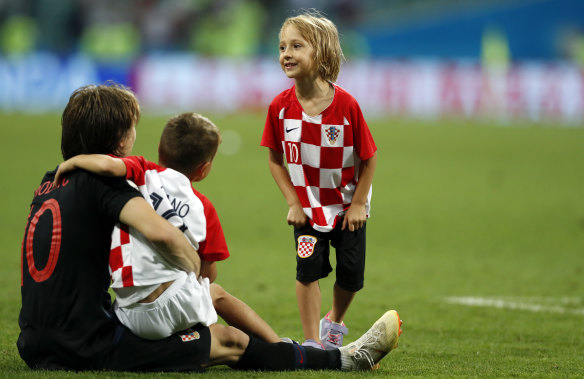 Family affair: Croatia's Luka Modric celebrates after winning the quarter-final.