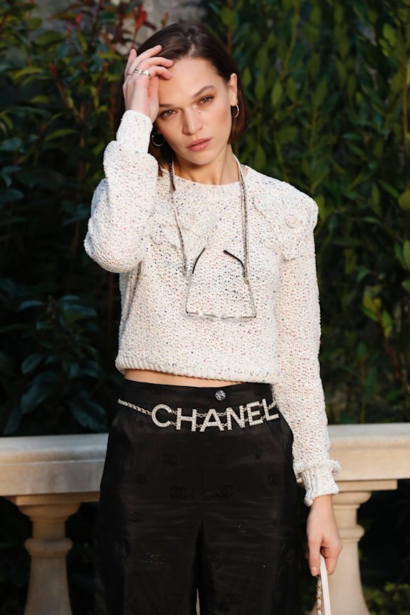 British actress and model Anna Brewster poses during a photocall before the presentation of Chanel's Spring/Summer 2019 Haute Couture fashion collection presented in Paris.