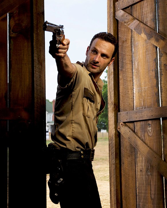 Fight for survival: cop Rick Grimes (Andrew Lincoln) in the hit zombie series <i>The Walking Dead</i>. The show premiered in 2010.