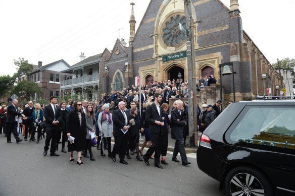 Mourners paid respect to former Fairfax and ABC journalist Deborah Cameron at St James Catholic Church in Glebe on Monday.