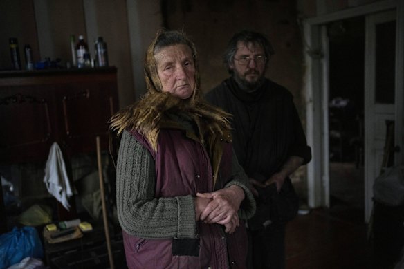 Nadiya Trubchaninova, 70, and her son Oleg, 46, inside the room of another son Vadym, 48, who was killed by Russian soldiers in Bucha.