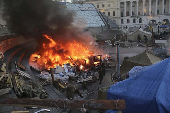 A tent burns in the anti-government protesters camp at Independence Square in Kiev February 18, 2014. Ukrainian riot police advanced on the heart of 12-week-old protests against President Viktor Yanukovich on Tuesday and security forces set a deadline to end disturbances after at least five protesters were reported killed in a day of clashes.