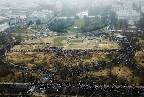 Protester gather of the Ellipse near the White House during the Women's March on Washington during the first full day of Donald Trump's presidency. 