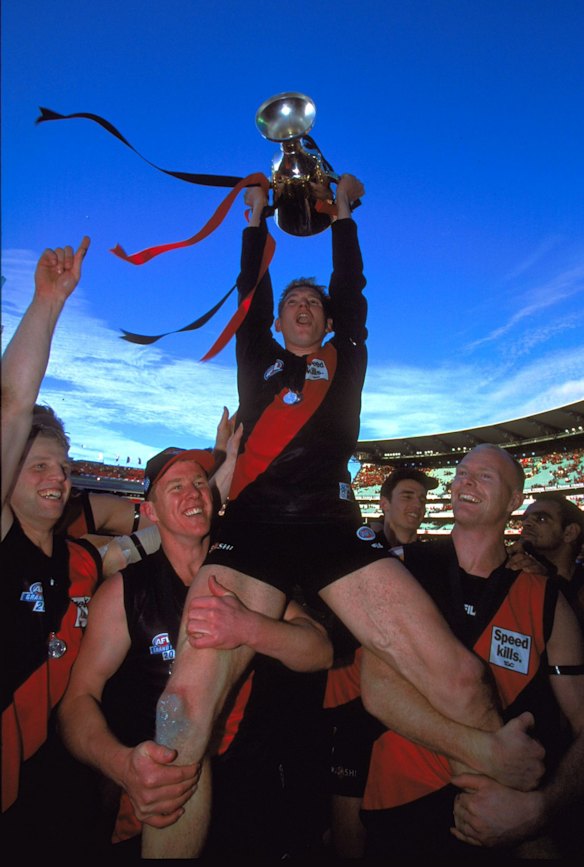 2 Sep 2000:  James Hird #5 for Essendon celebrates with the Premiership Cup after their win, in the AFL Grand Final match between the Essendon Bombers and the Melbourne Demons, played at the Melbourne Cricket Ground in Melbourne, Australia.  