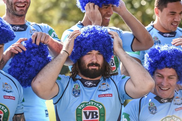 Aaron Woods straightens his wig.