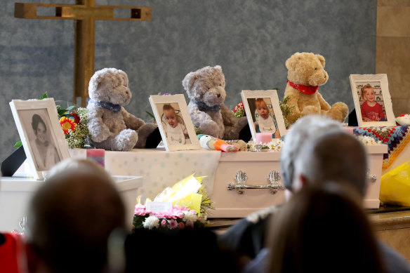 The coffins of (L-R) Mara Harvey and her daughters Beatrix, Alice and Charlotte.