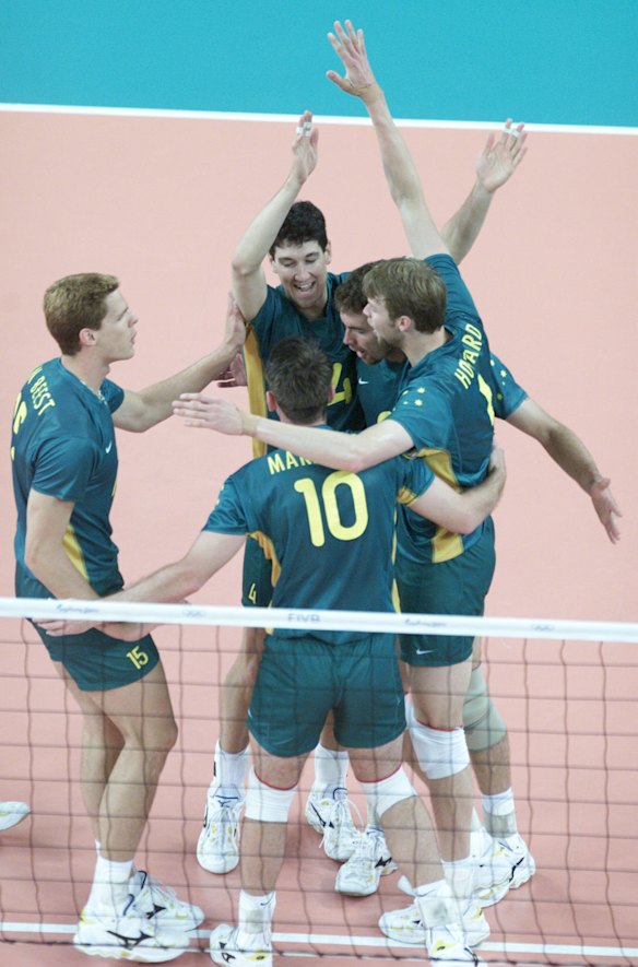 Australia celebrate after winning a point against Cuba in the Men's volleyball.