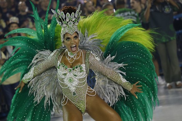 A performer from the Imperio Serrano samba school parades during Carnival celebrations at the sambadrome in Rio de Janeiro.
