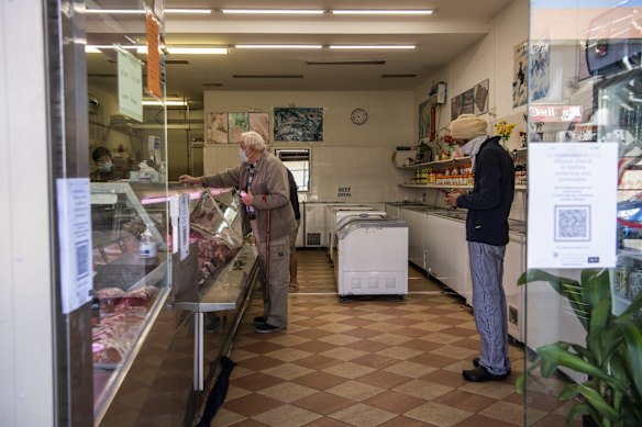 Daily life in Campbelltown during lockdown. Local residents at the Campbelltown Butchery & Chicken Shop. 