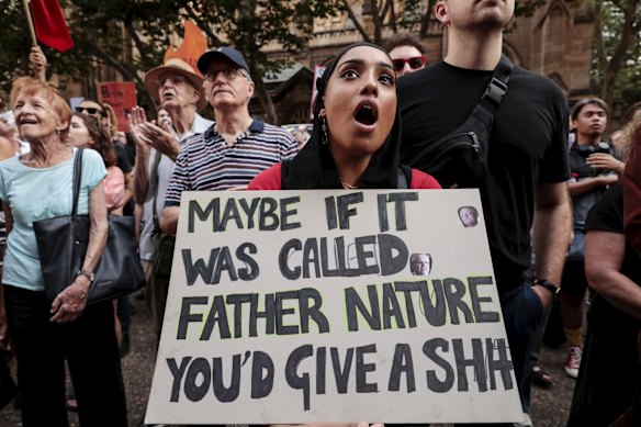 Thousands gather at Town Hall in Sydney CBD to demand action on climate change and the deposition of Prime Minister Scott Morrison.