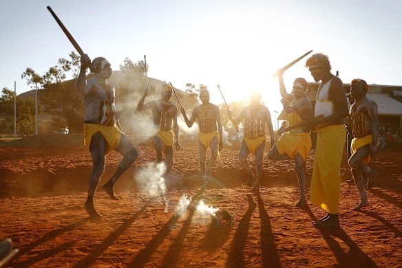 Gumatj clan ceremonial leaders performing the Gurtha ceremony at the opening ceremony of the First Nations National Convention held in Uluru, at the Mutitjulu community.