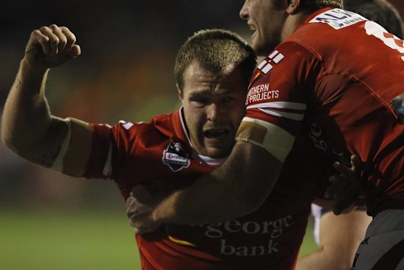 Dragons Trent Merrin celebrates a try with team mate Mitch Rein.