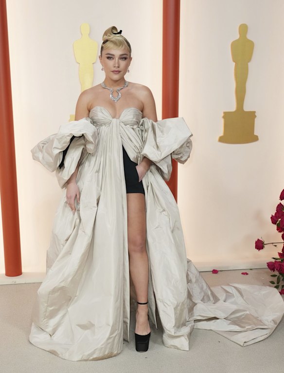 Florence Pugh wears Valentino couture.