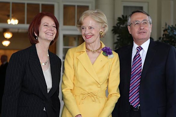 Prime Minister Julia Gillard with Quentin Bryce and Wayne Swan at Government House after being sworne in as Australia's first female Prime Minister.