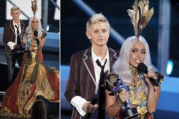 Lady Gaga accepts an award from Ellen De Generes. The pop star was nominated for a record 13 gongs