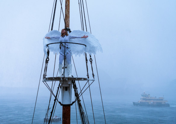 Sontaan Hopson of the Come you Spirits theatre group, rehearses  Shakespeare’s The Tempest during storms in Sydney on Monday.
