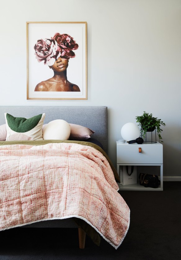 The master bedroom is decorated with a gentle mix of light grey, olive green and blush. The artwork above the bed is Beautiful Morning by Brent.