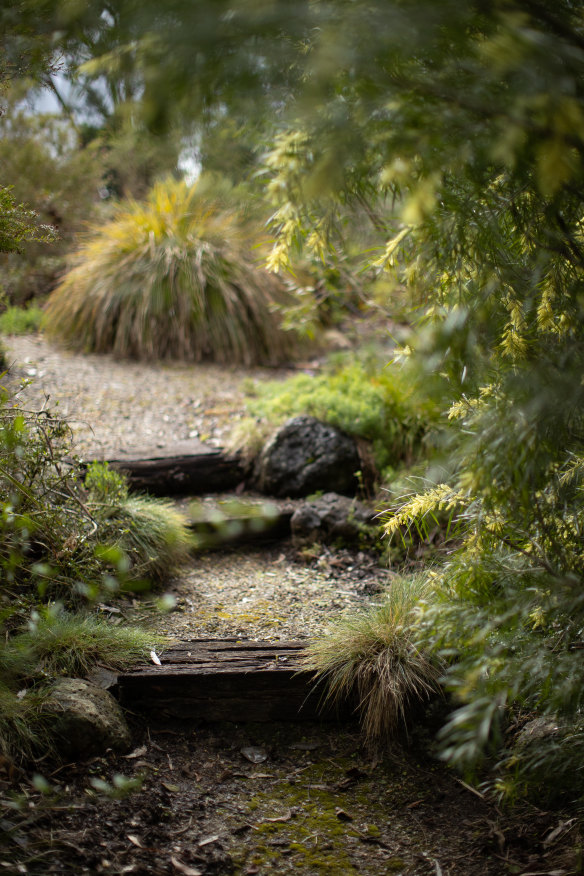 Soft-edged paths wind through the inner garden