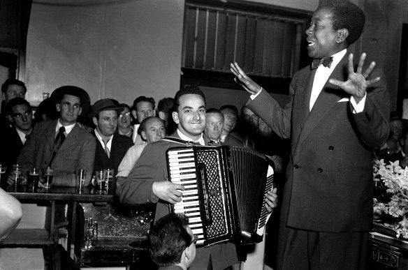 Vocalist Nellie Small and accordionist Gus Merzi perform at the Hotel Castlereagh on August 20, 1954.  Of West Indian heritage but Sydney-born, Small was described in the papers of the time as a "male impersonator".