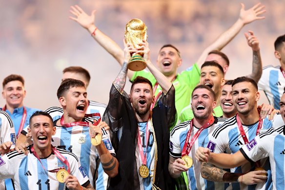 Lionel Messi of Argentina lifts the FIFA World Cup Qatar 2022 Winner's Trophy during the FIFA World Cup Qatar 2022 Final match between Argentina and France at Lusail Stadium in Lusail City, Qatar. 